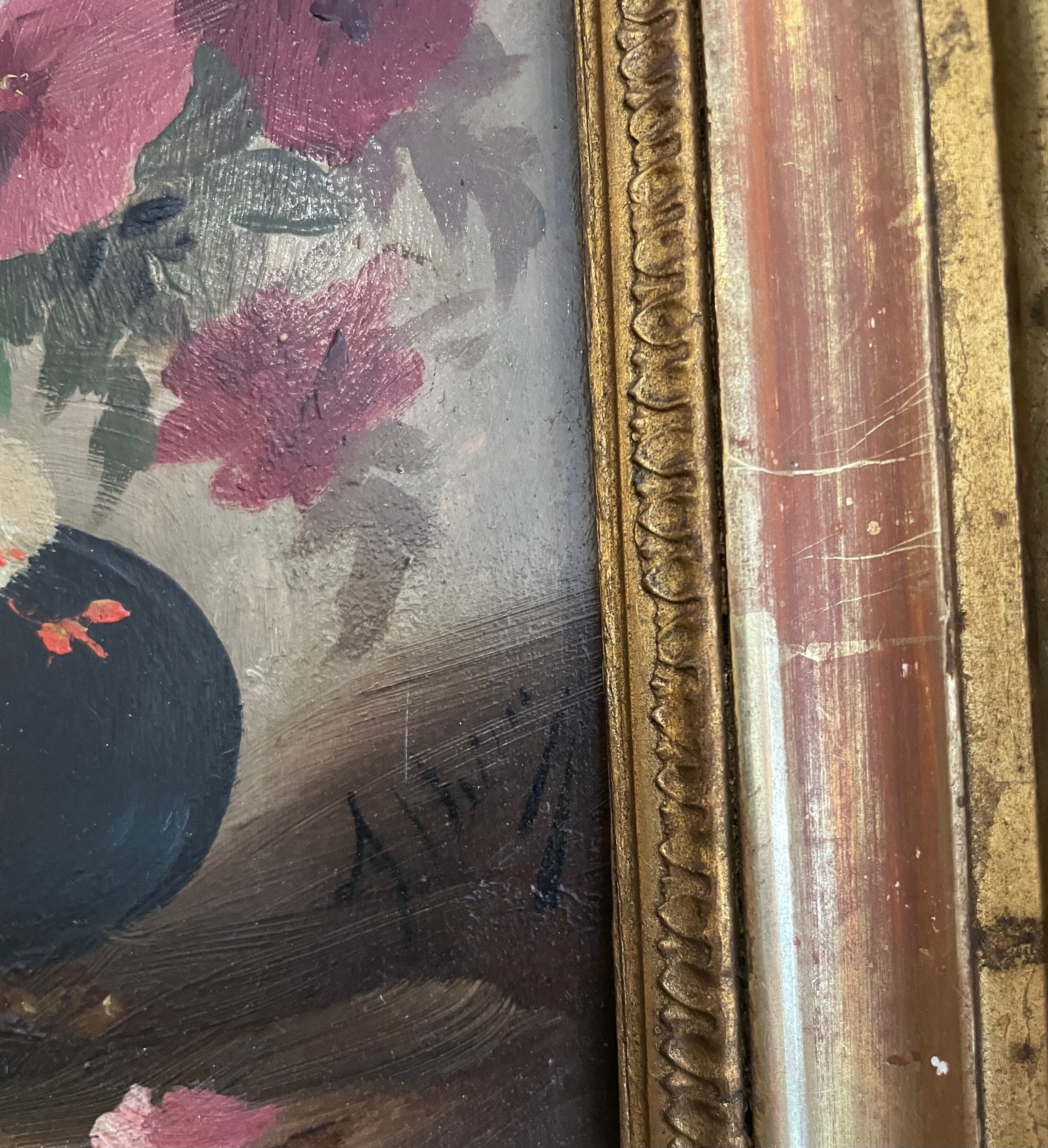 Golden framed flower bouquet painting