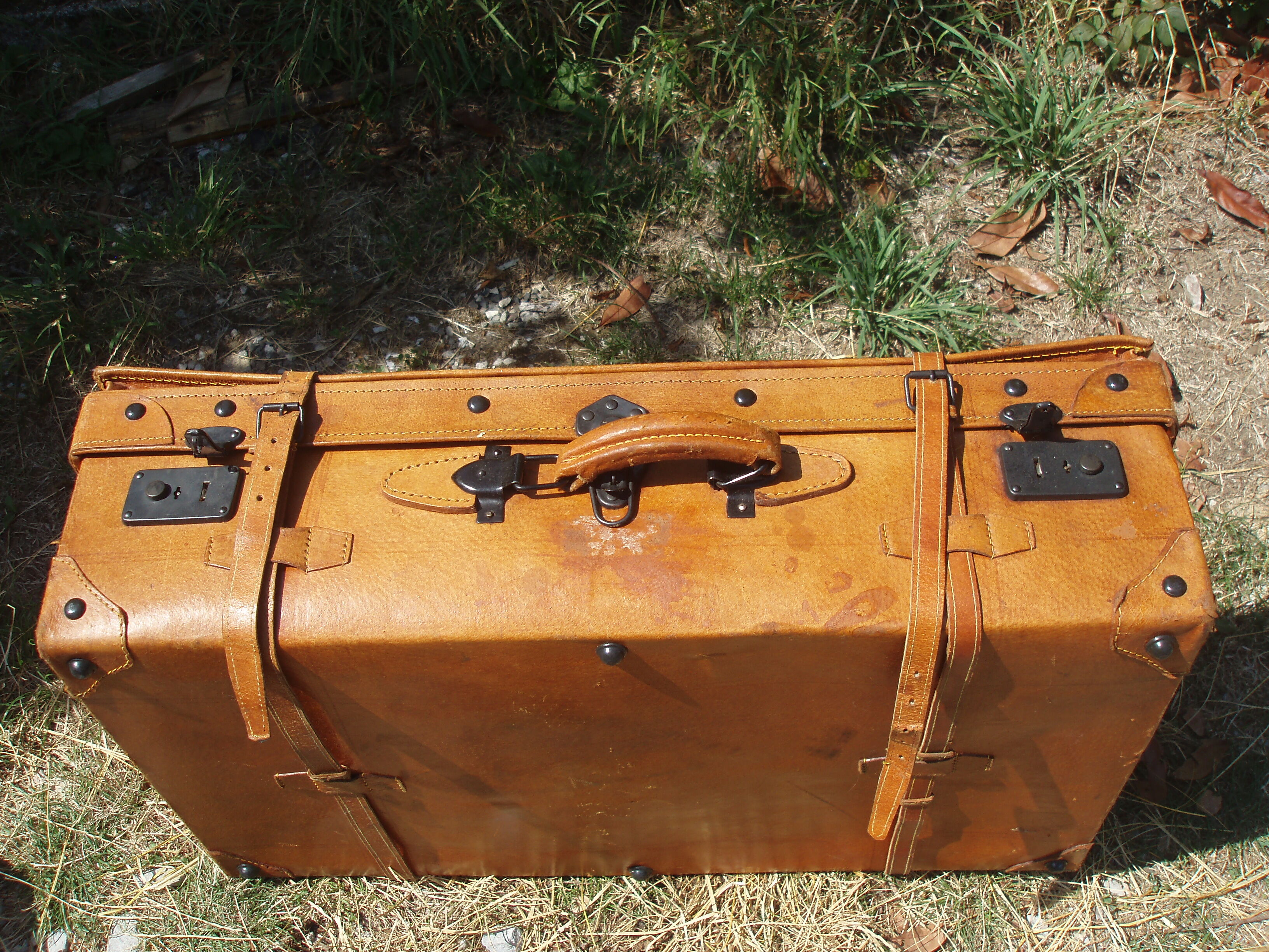 Old quality brown leather suitcase from the 60s