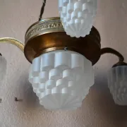 Art Deco lustre in brass and frosted pressed glass from the 1930s.