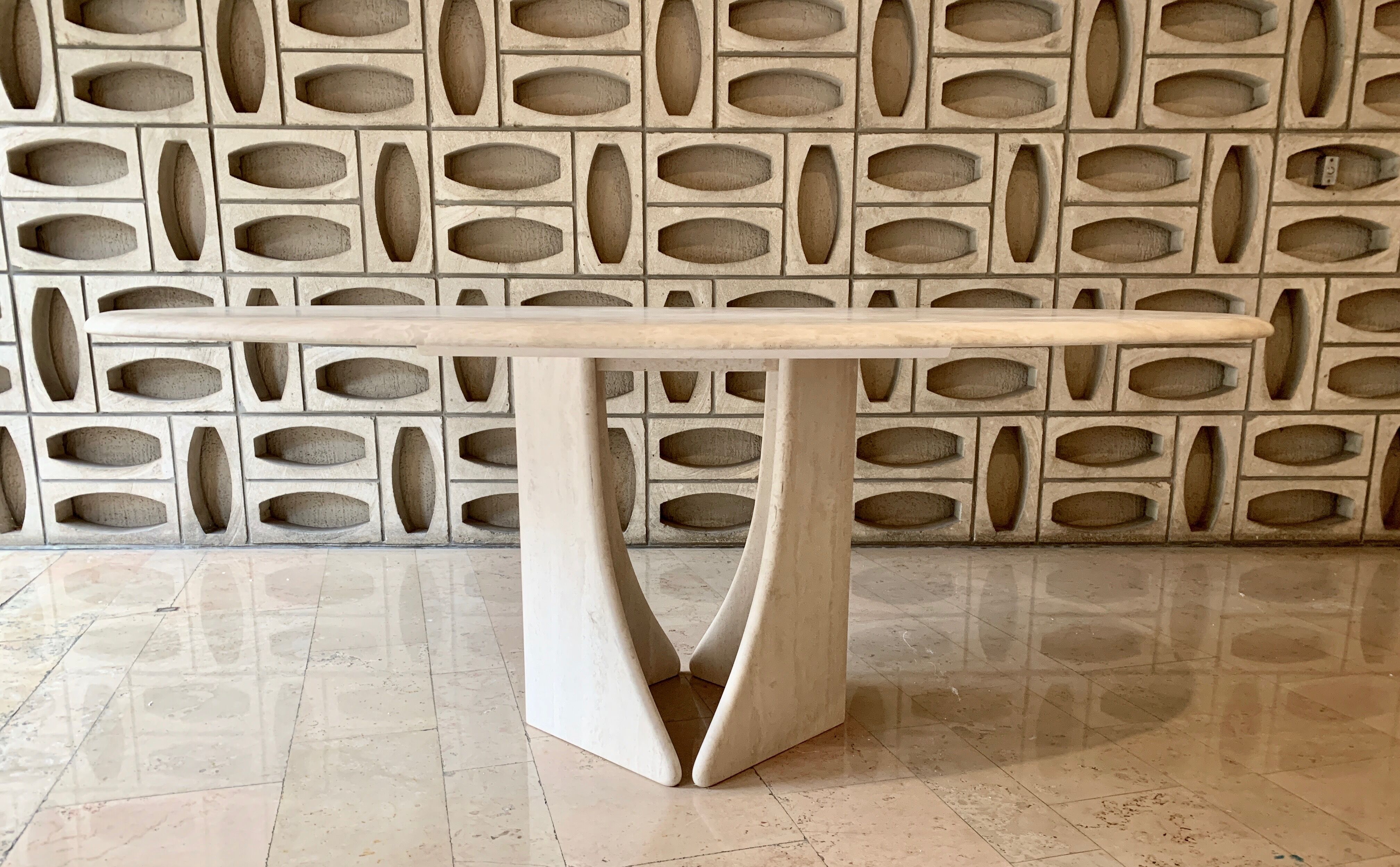 Oblong travertine dining table