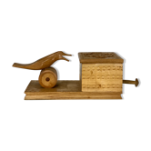 Mechanical cigarette picker, hand-carved wood