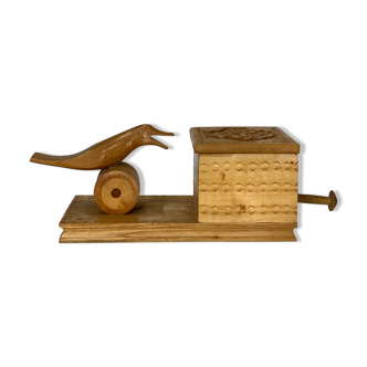 Mechanical cigarette picker, hand-carved wood
