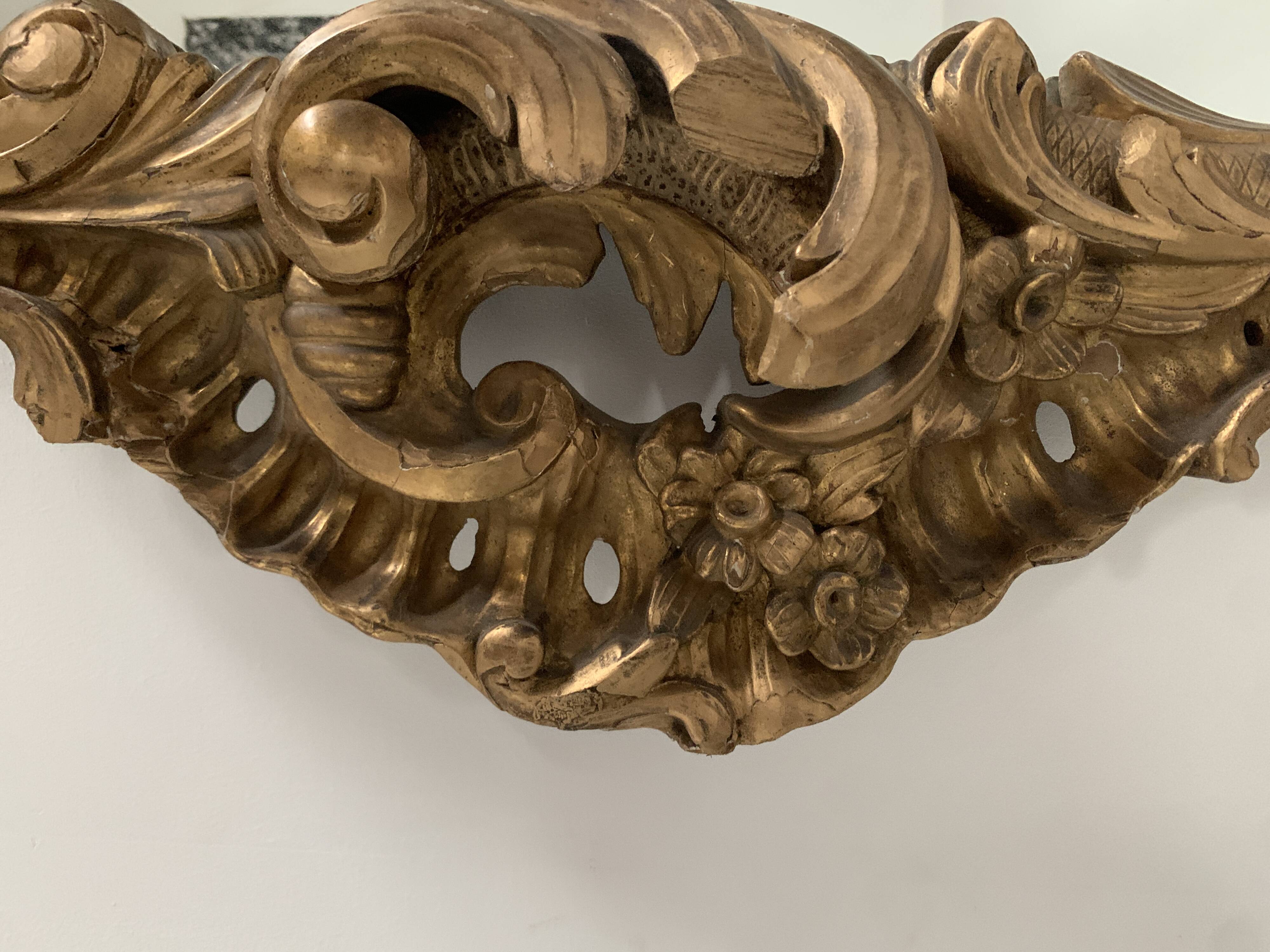 Louis XV mirror in carved gilded wood, late 18th century