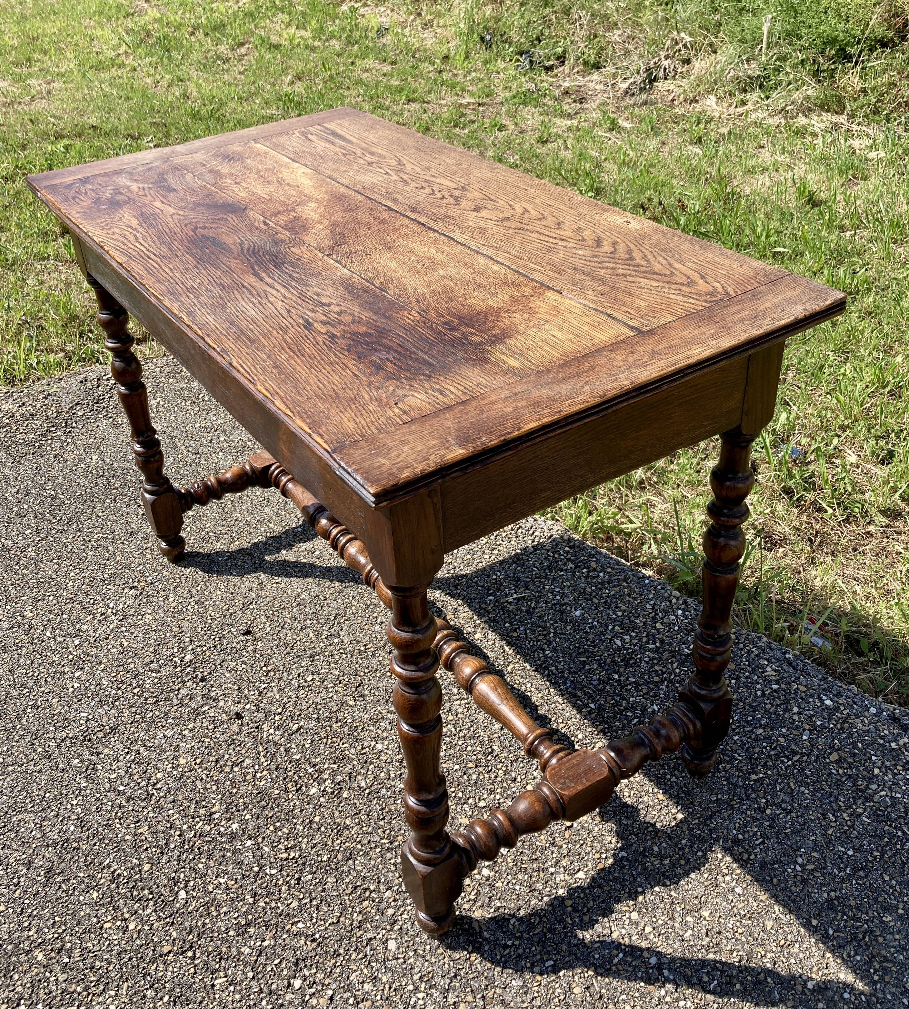 Rustic desk with two drawers with brace and turned legs