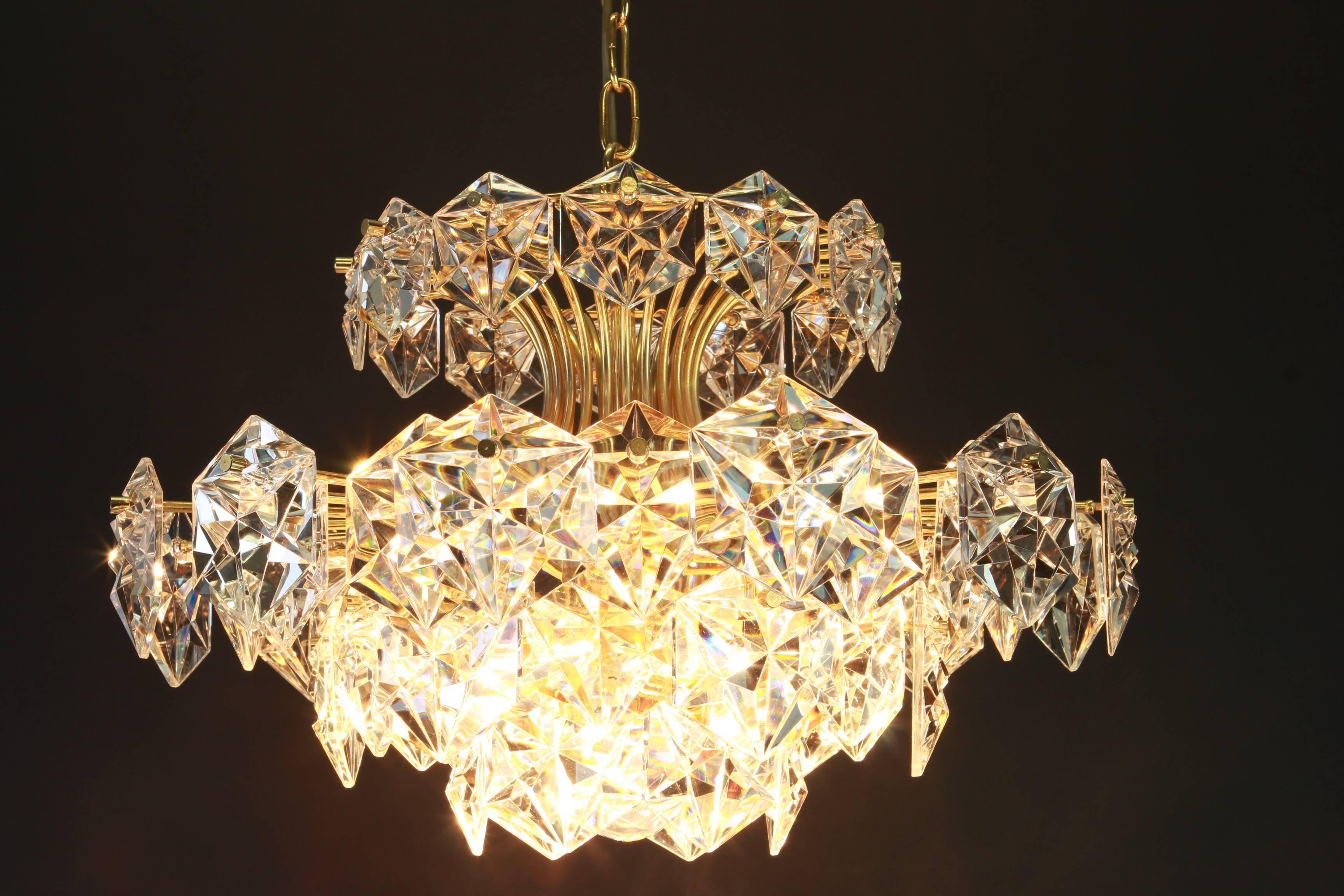 Chandelier in gilded brass and crystal glass by Kinkeldey, Germany, 1970s.