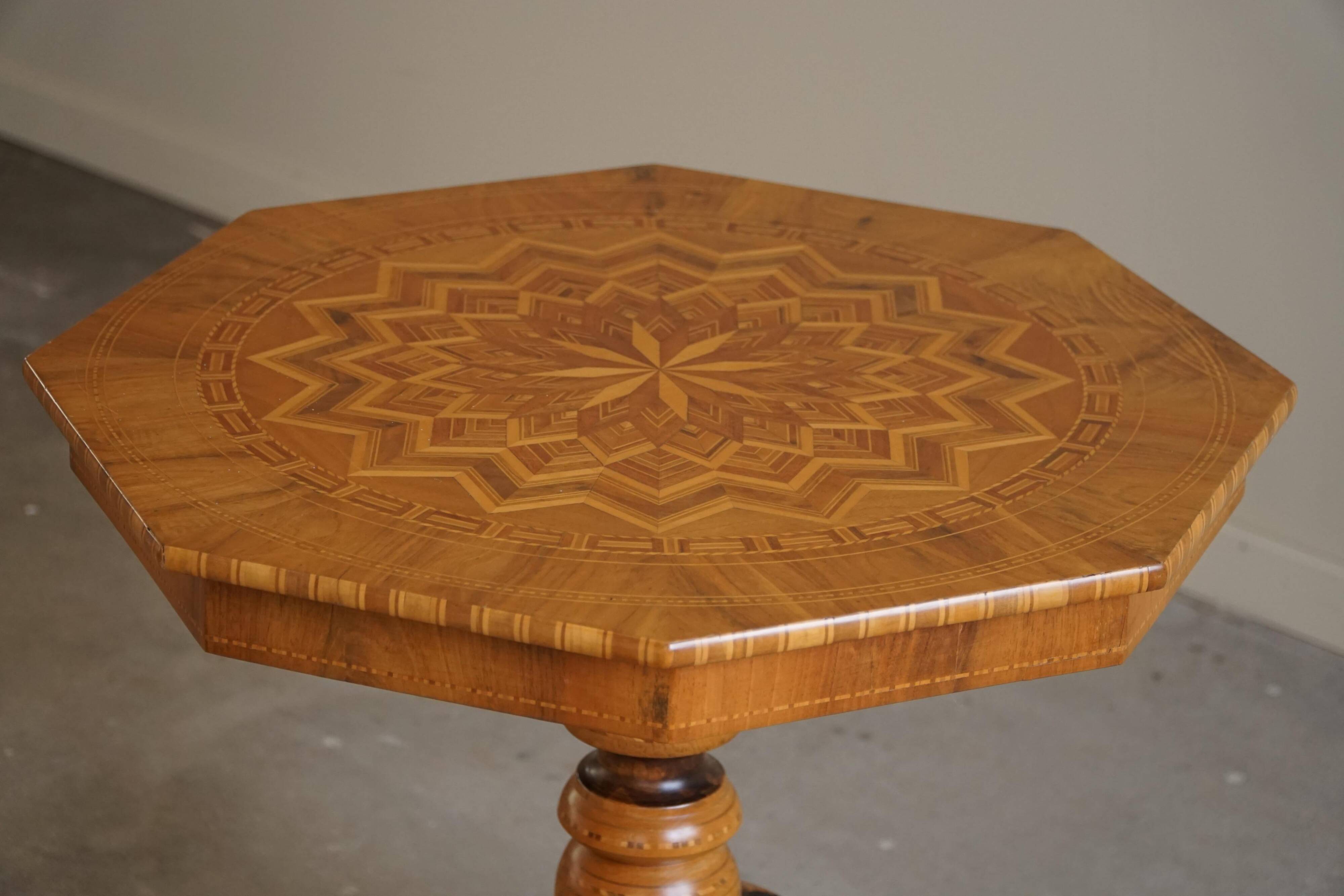 Danish Art Deco octagonal side table in birch with an inlaid top, 1940s.