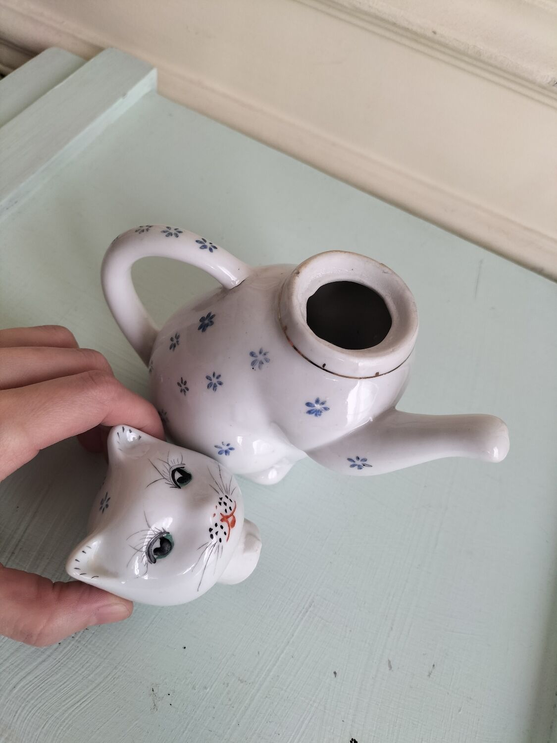 Porcelain teapot cat