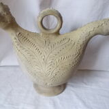 Old grey terracotta jug