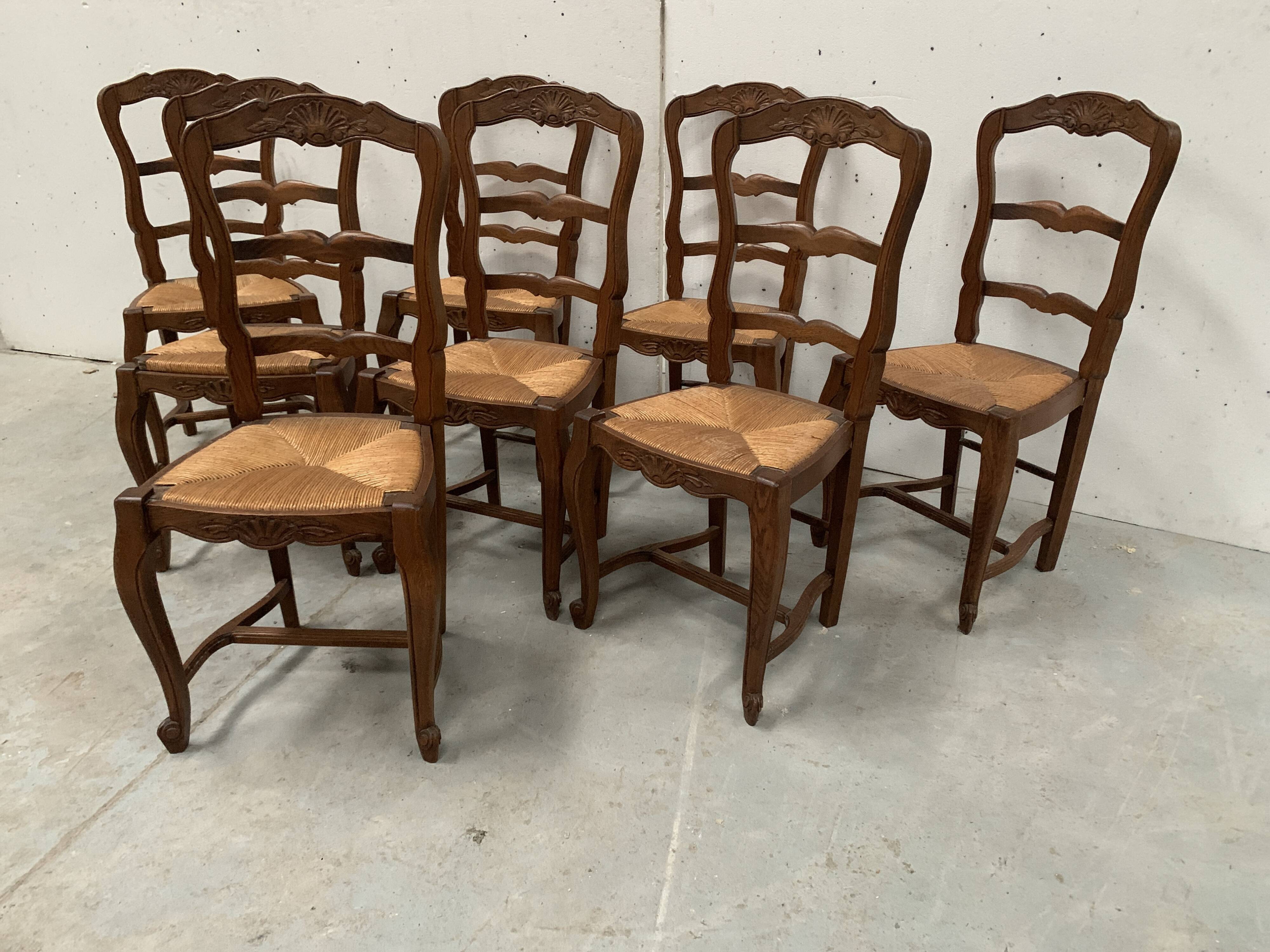 Set of eight 20th-century Regency-style chairs in solid oak