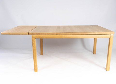 Coffee table of beech wood and with extension leaf of danish design by Rubby Furniture