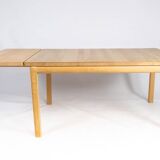 Coffee table of beech wood and with extension leaf of danish design by Rubby Furniture
