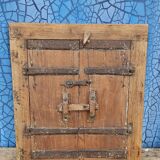 Old wooden tribal window