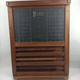 Old billiard abacus with branded slate