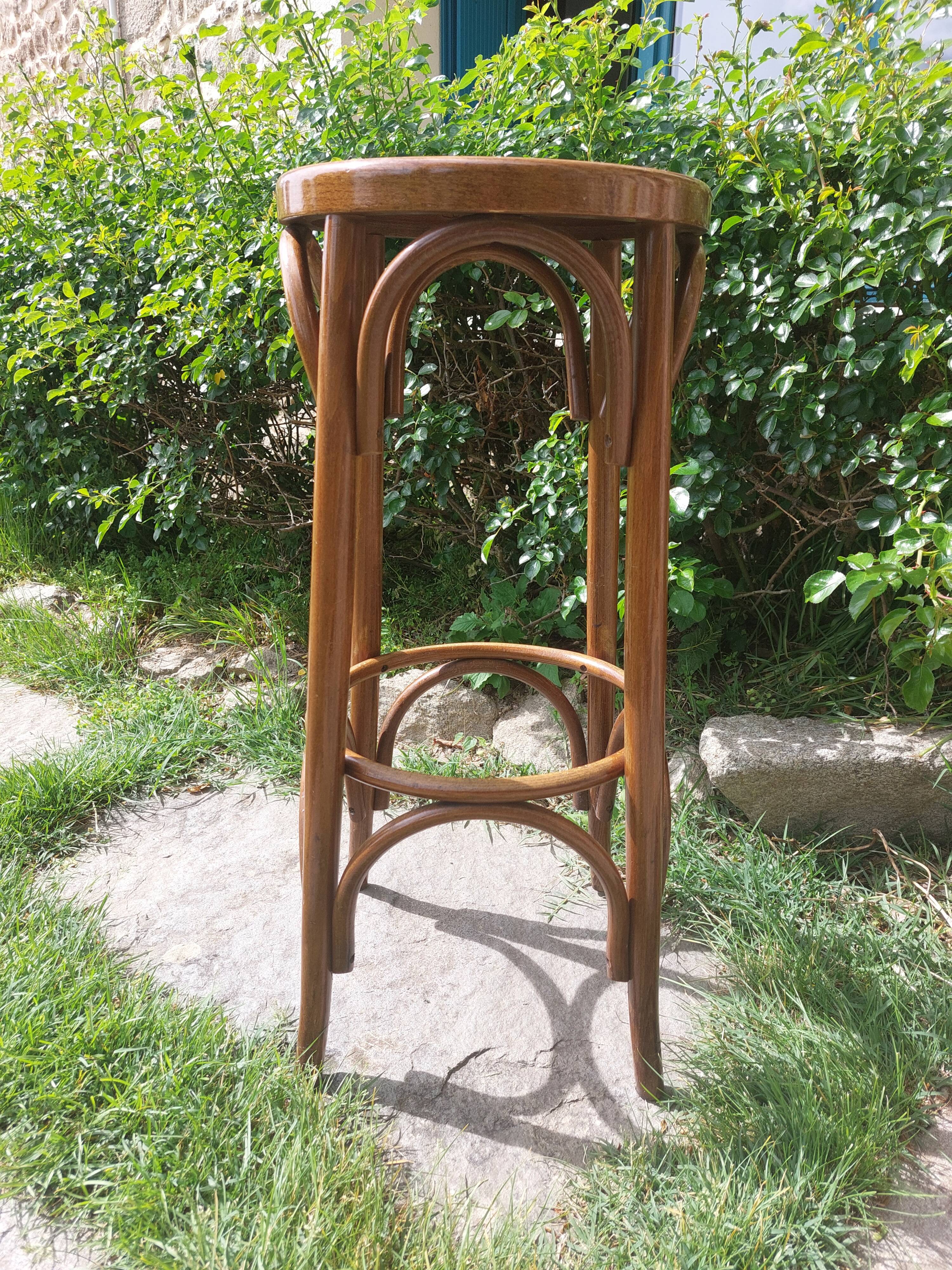 curved wooden bar stool
