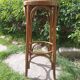 curved wooden bar stool