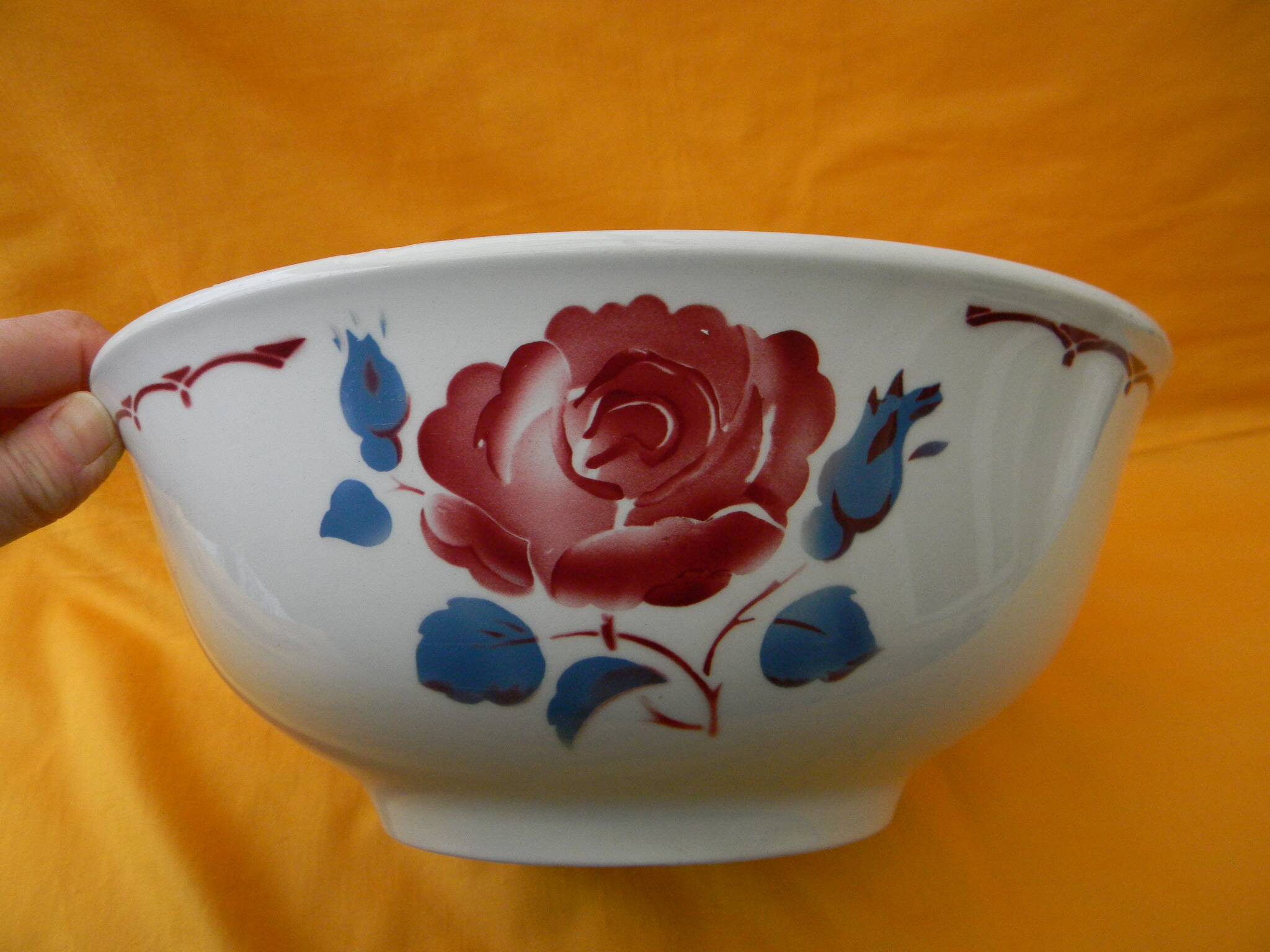 Vintage earthenware salad bowl. Flower decor.