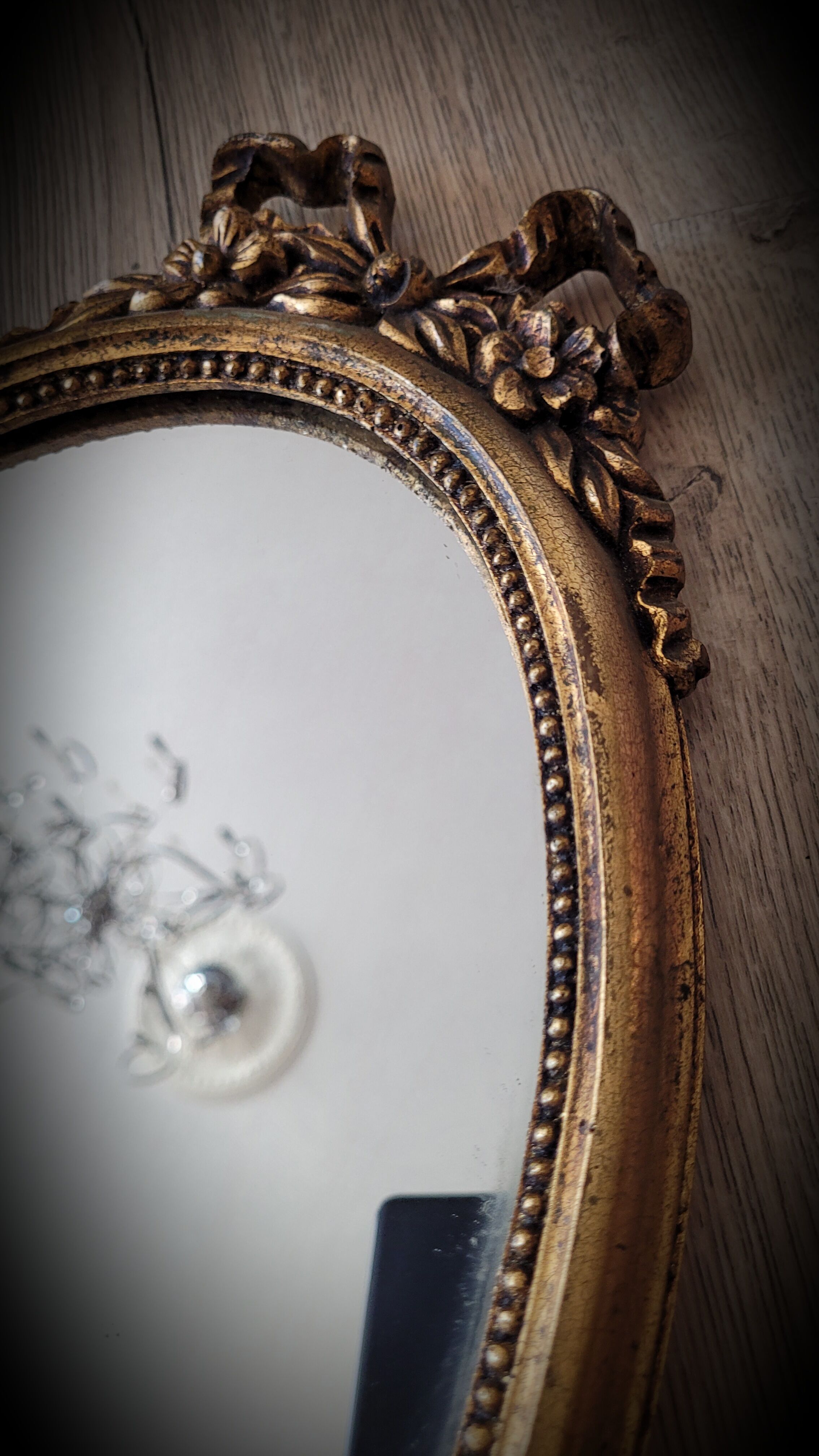 Oval golden mirror 41x23