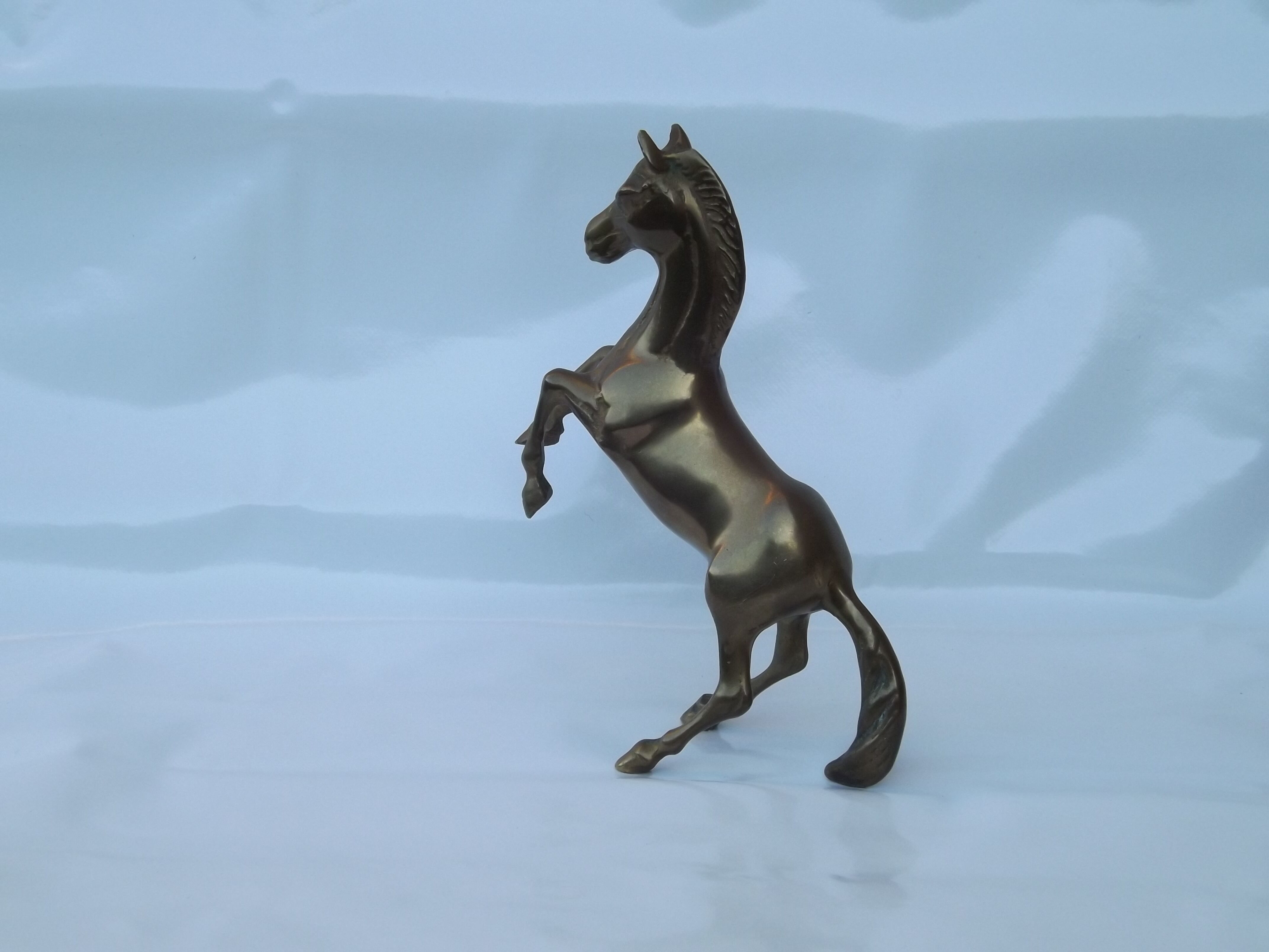 Golden bronze horse