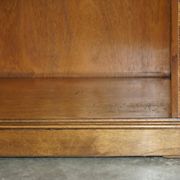 Pair of Sheraton Revival bookcases in satinwood, walnut, and yew.