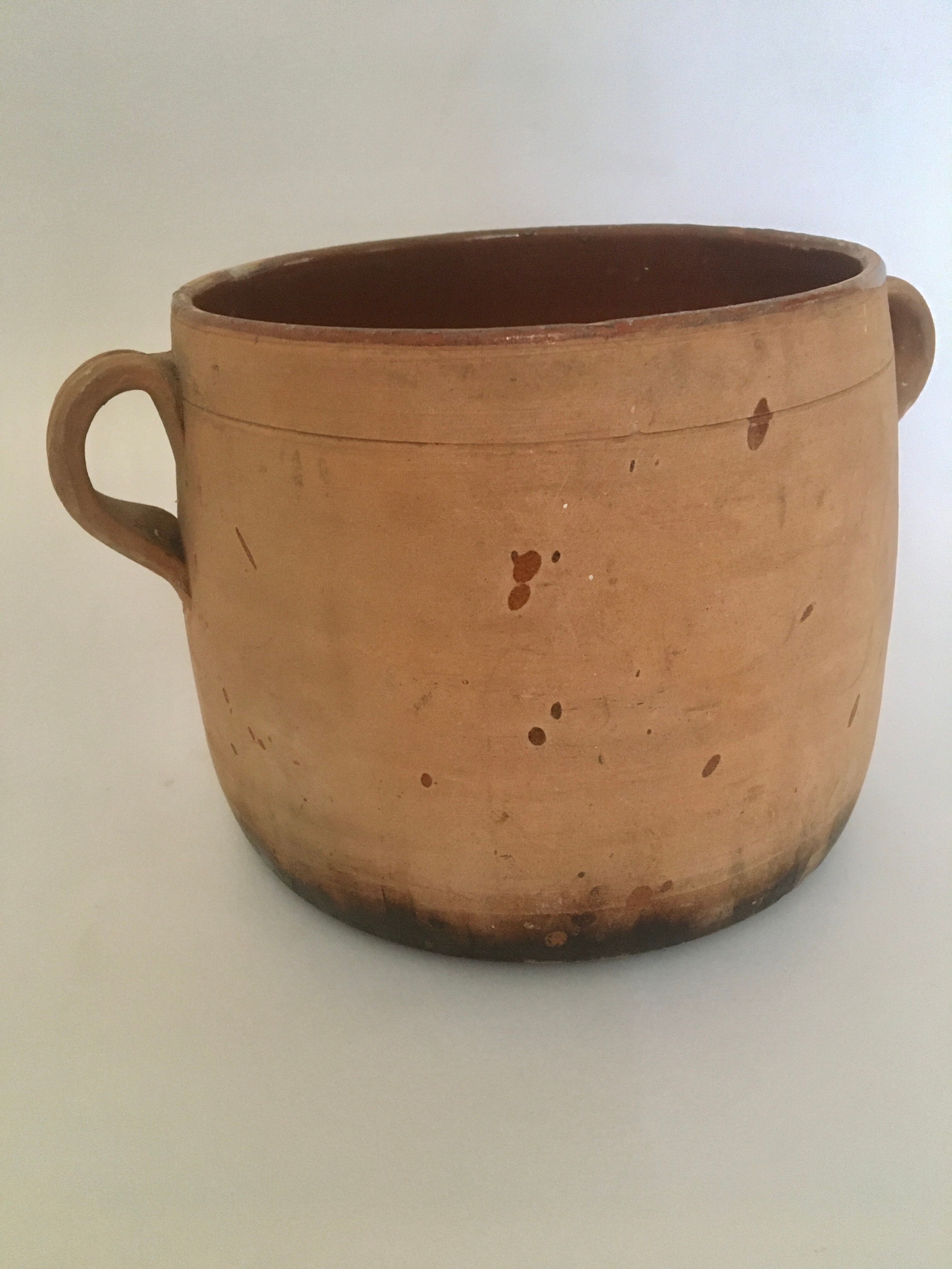 Terracotta marmite and enamelled interior