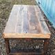 Industrial coffee table with wooden top and metal legs