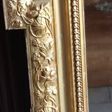 Antique mirror in wood and gilded stucco, neo Louis XVI style.