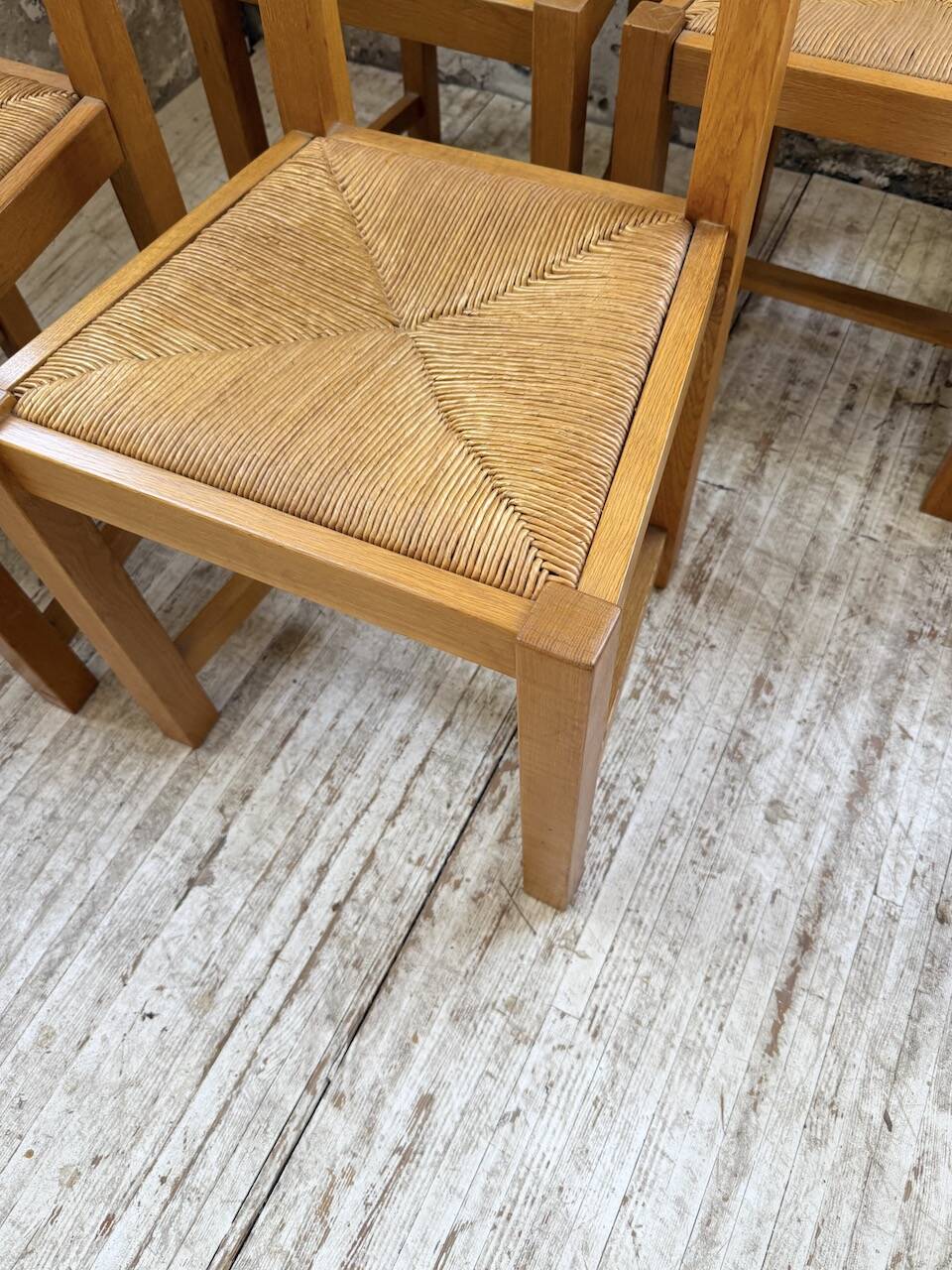 Set of 8 blond oak chairs with straw seats