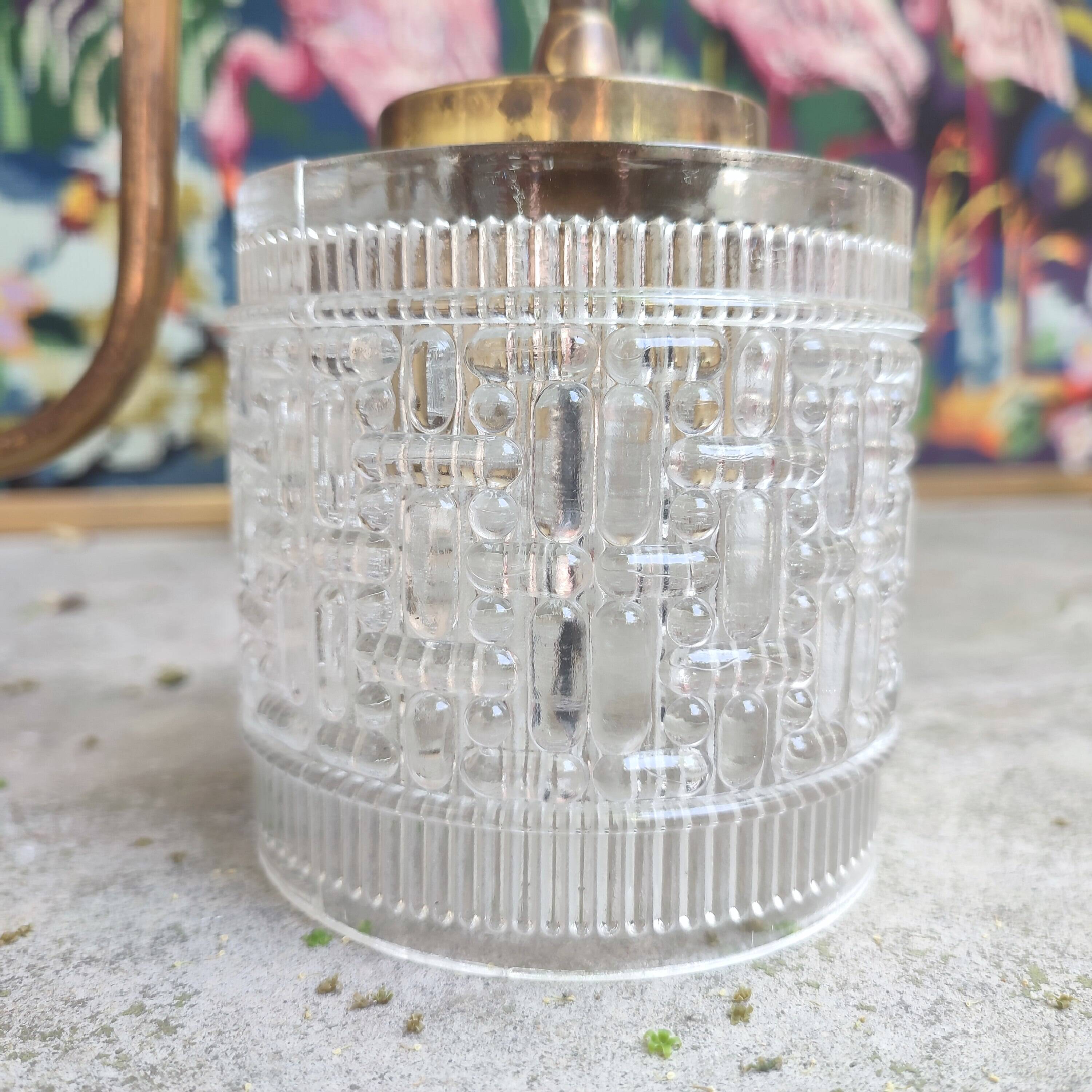 Pair of cylindrical tulip wall lights from the 1950s.