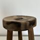 Patinated tripod stool