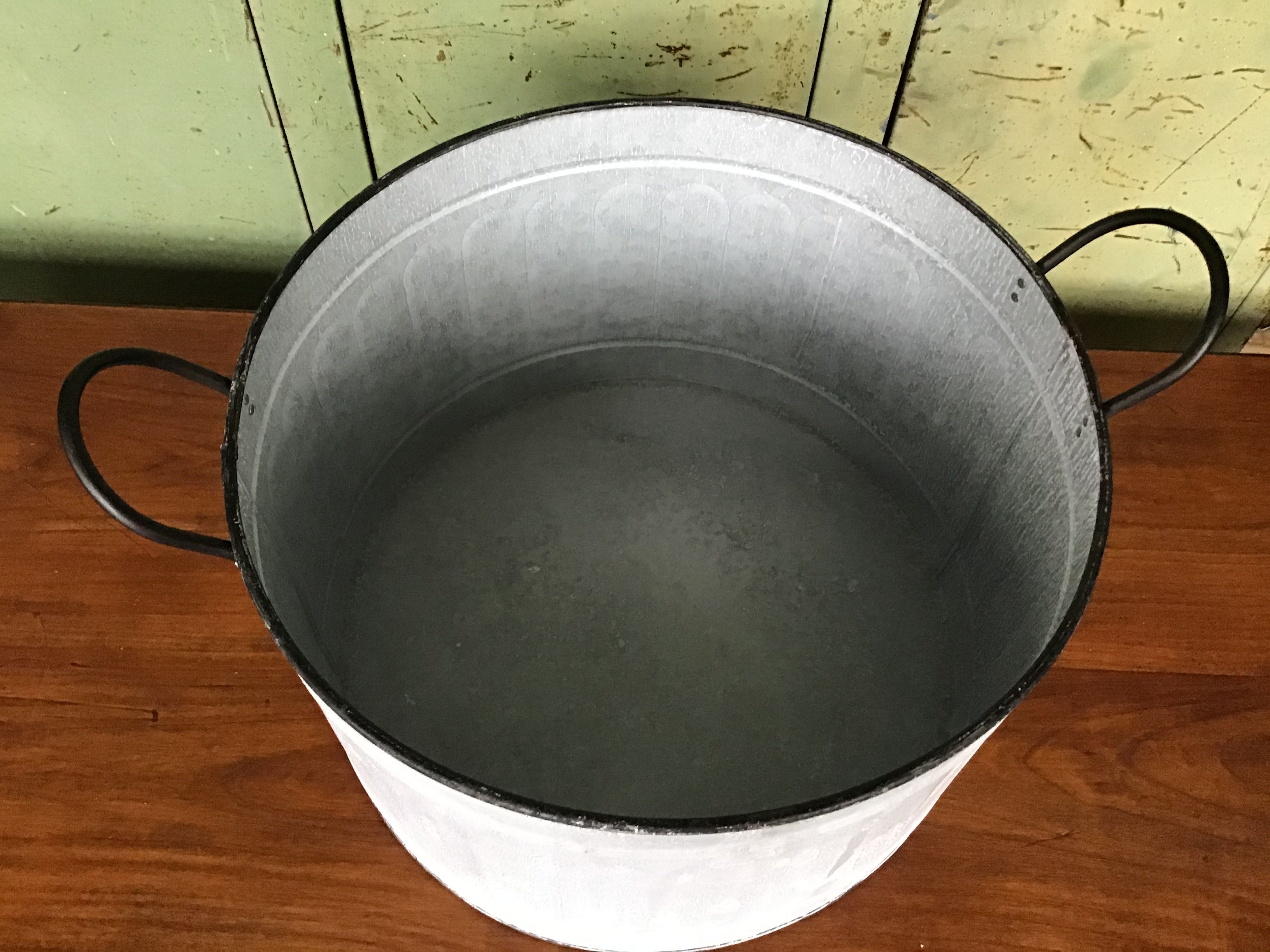 large round basin in vintage zinc