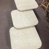 Modular pull-out coffee tables in travertine
