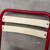 Red and white Tolix chair