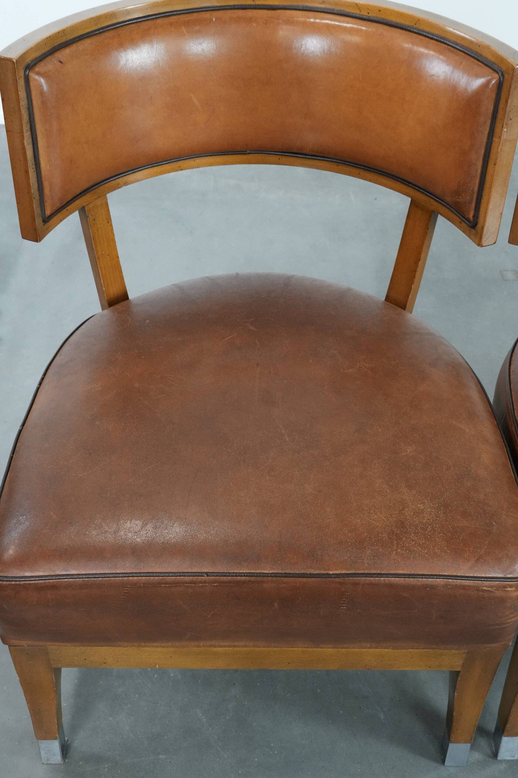 Set of 2 vintage design cocktail chairs/armchairs made of sheepskin leather