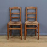 Pair of rush-seated chairs in cherry wood – late 19th century