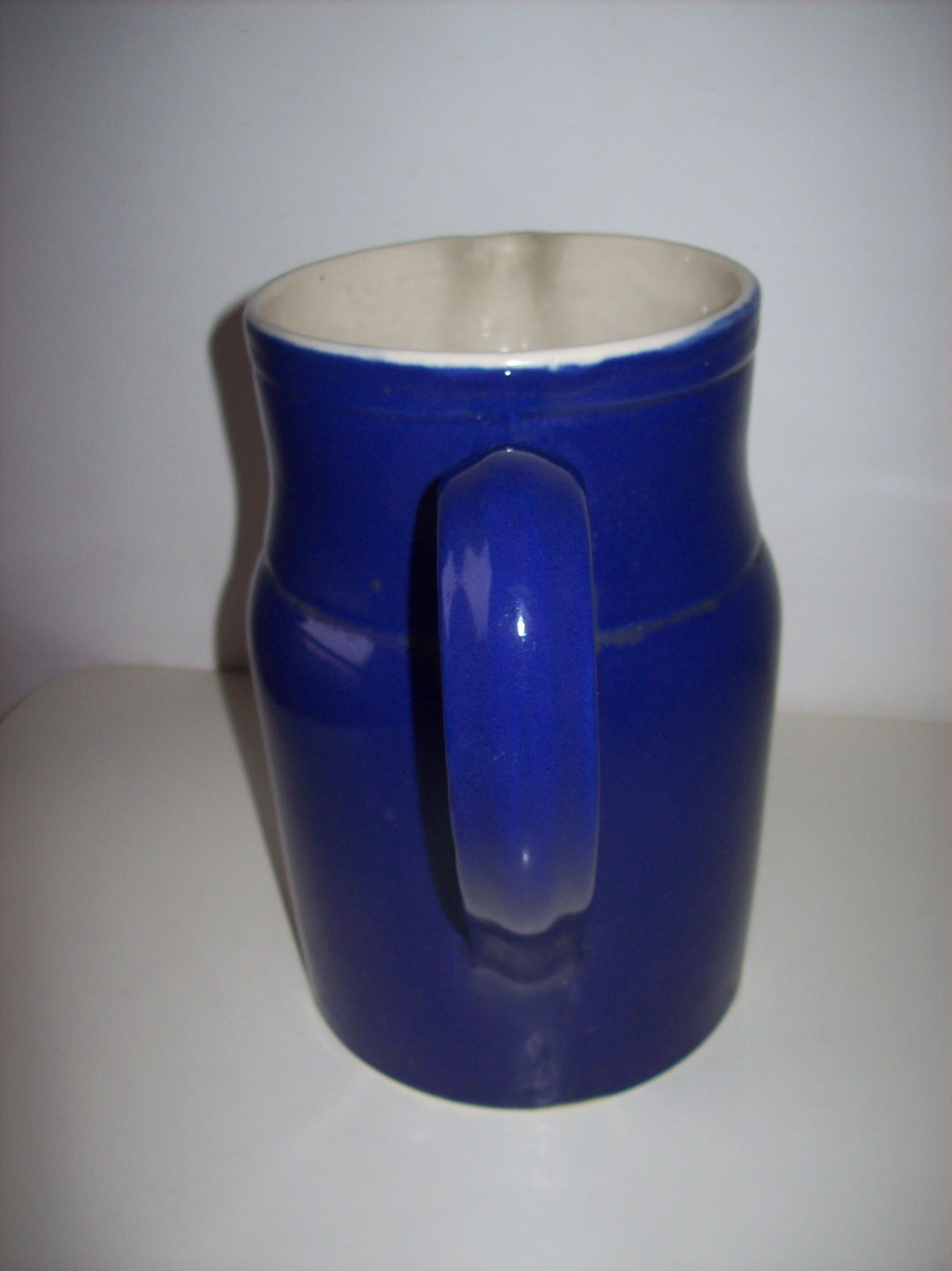 Old blue ceramic Digoin pitcher