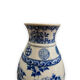 Pair of Asian vases in white and blue porcelain