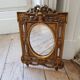 Old small golden mirror