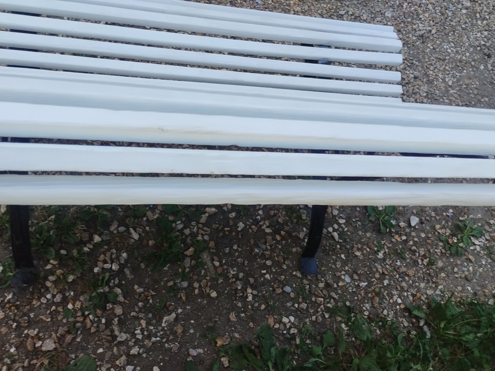 Antique garden bench with cast iron legs