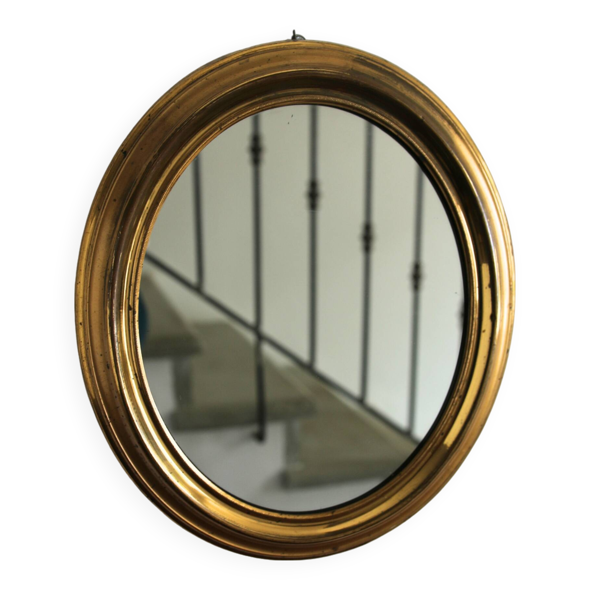 Oval brass mirror