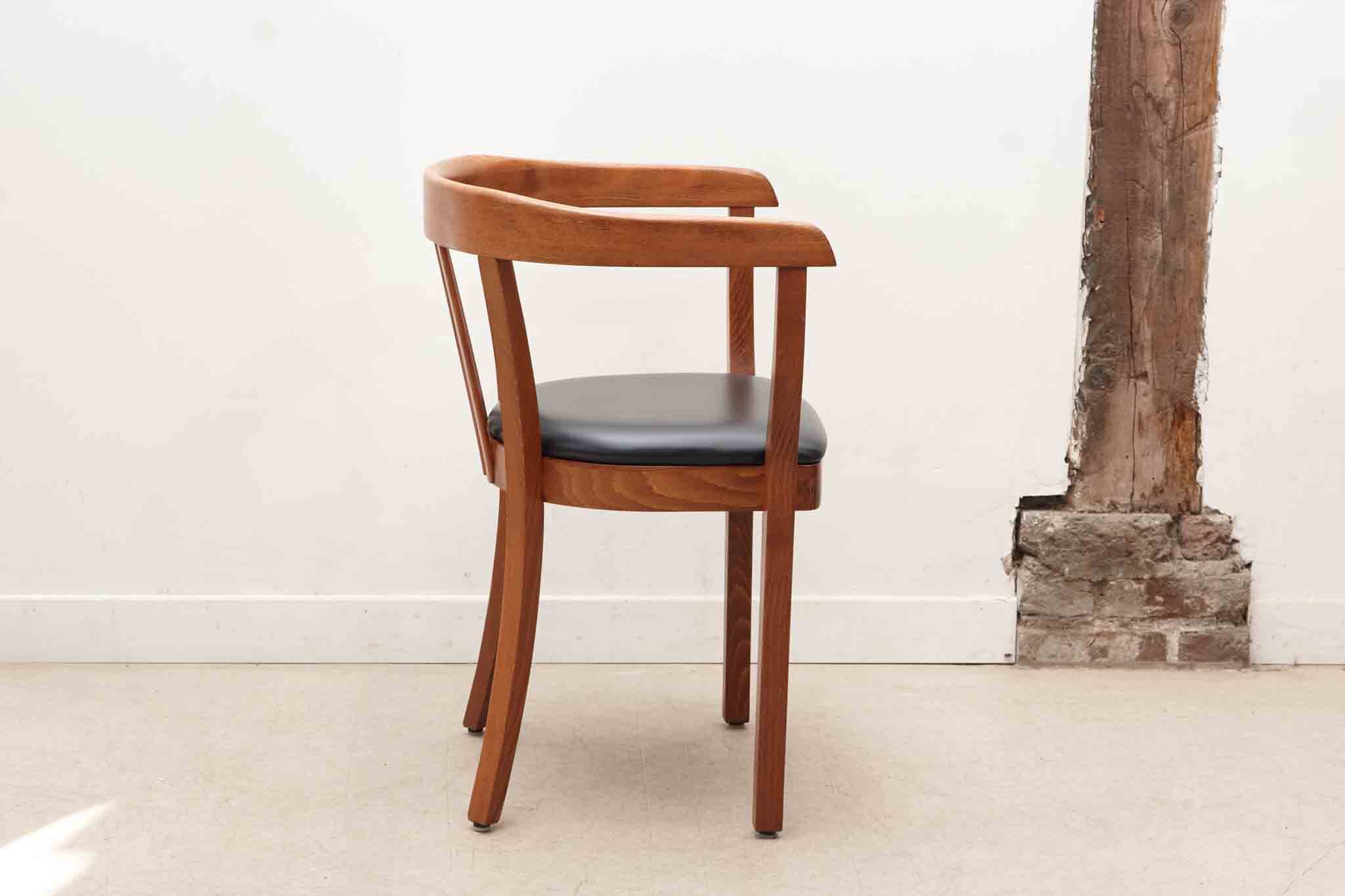 Stoelcker chair in black faux leather and oak