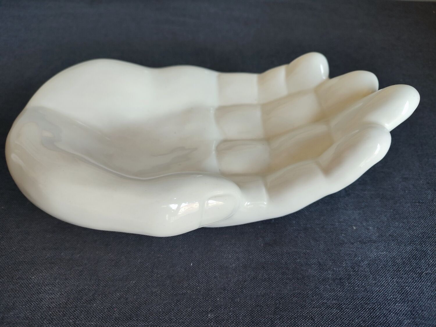 Empty hand ceramic pocket from the 80s