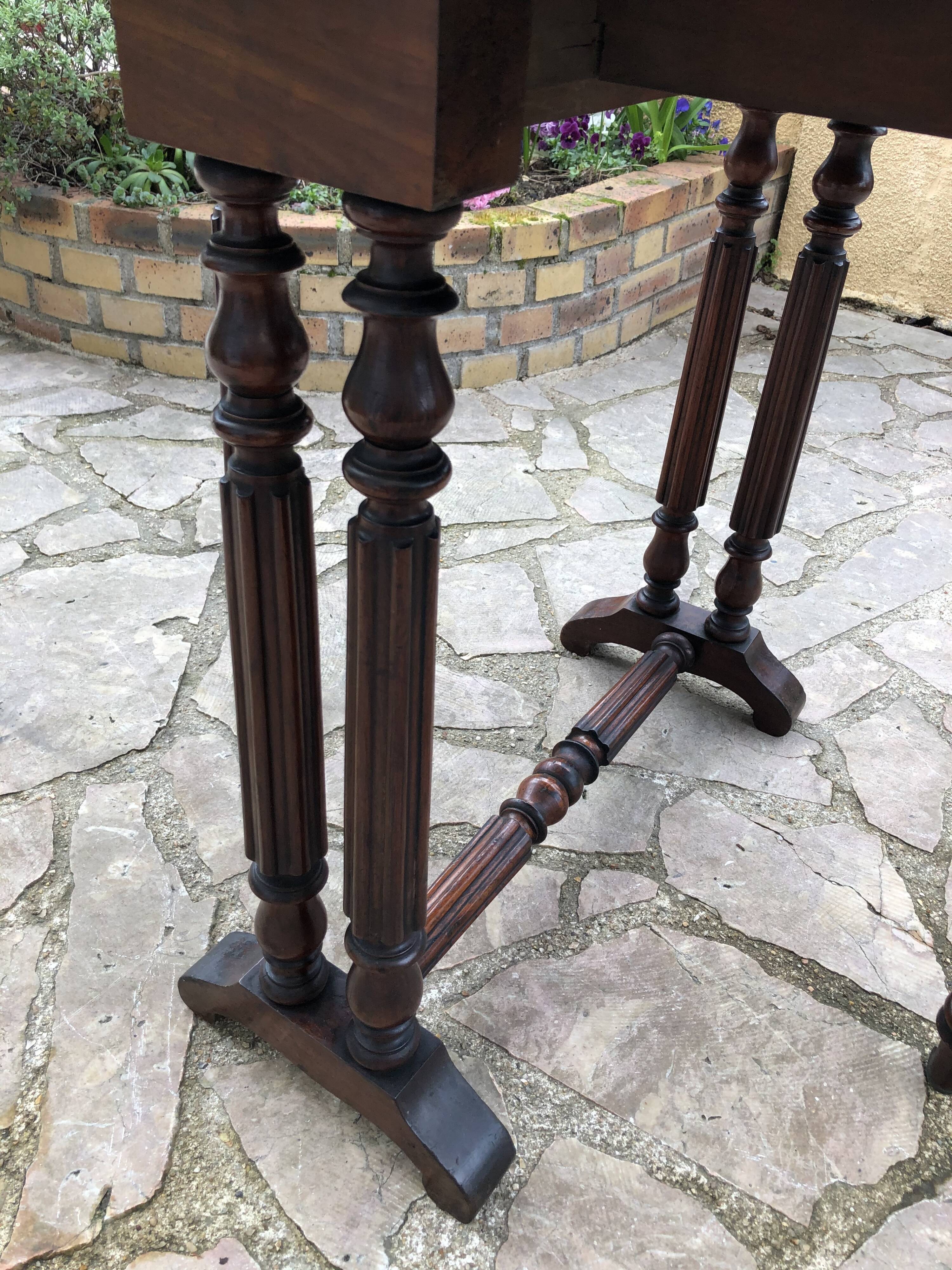 Side table with flaps
