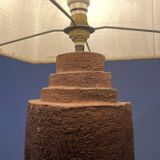 Large chamotte clay lamp in brutalist style, with a plant motif.