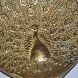 Brass pocket with peacock decoration