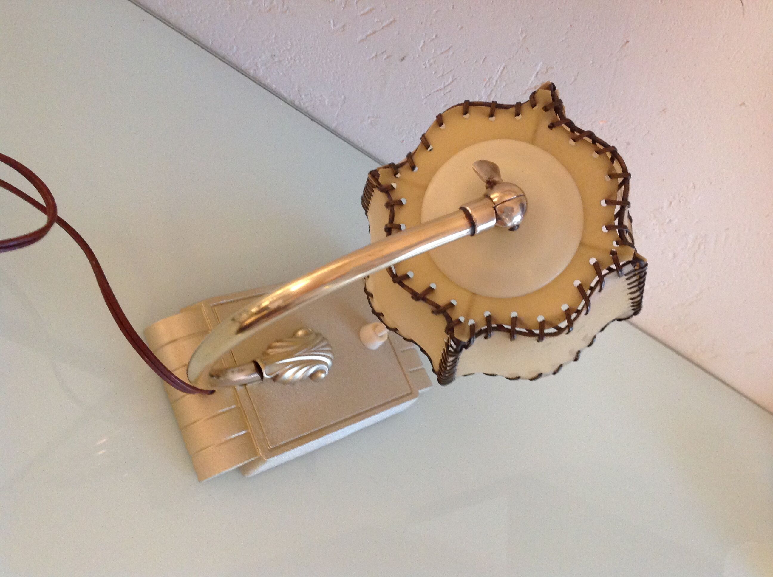 Brass bedside lamp and beige lampshade art deco style