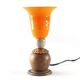 Orange glass ball lamp with wood