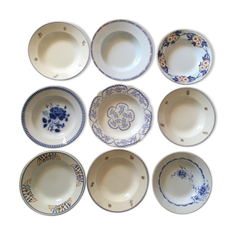 Old hollow plates in blue and brown of renowned earthenware