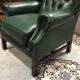 In the 1970s green leather Chesterfield armchair