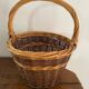 Two-tone wicker round basket from the 1980s.