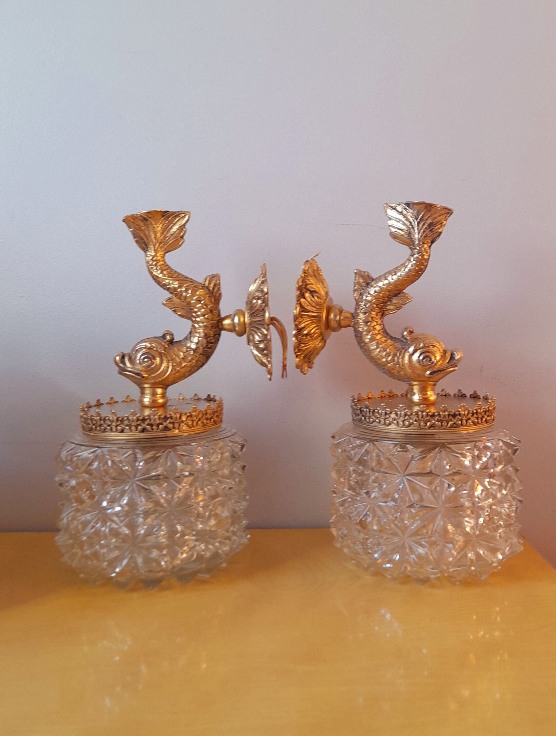 Pair of dolphin brass sconces